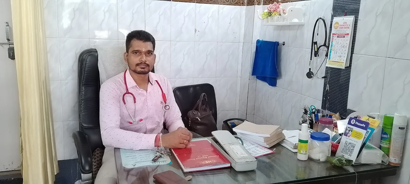 Dr Rohit B. Yadav seated in the consultation room at Bisnu Healthcare Clinic